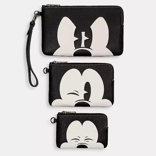 TRIO DE MONEDEROS DISNEY X COACH