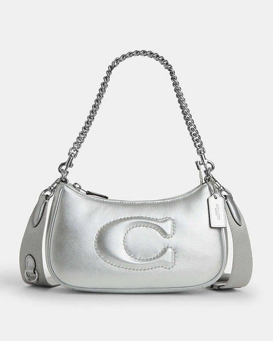 CARTERA COACH CUERO PLATEADO